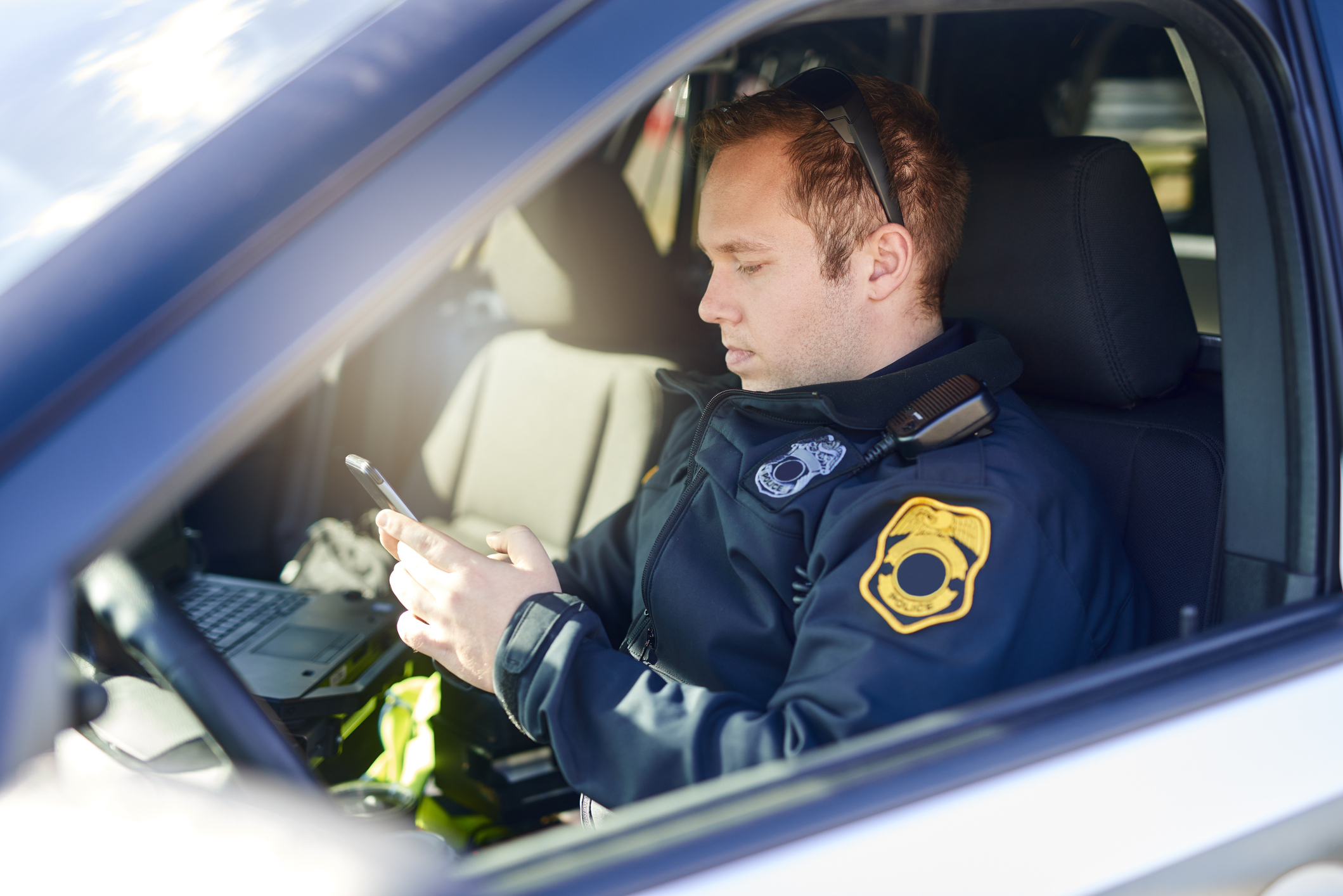 Police Officer using mobile device